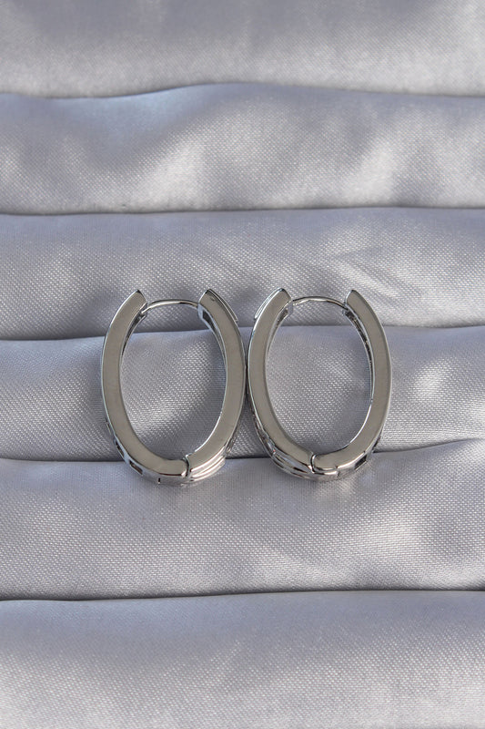 BKP9078 - Pirinç Gümüş Renk Zirkon Taşlı Oval Model Küpe