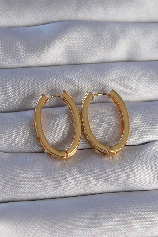BKP9079 - Pirinç Gold Renk Zirkon Taşlı Oval Model Küpe