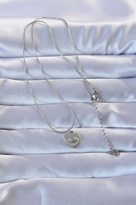 BKO9285 - 316L Gümüş Renk Zirkon Taşlı İşlemeli Göz Detay Kalp Kolye