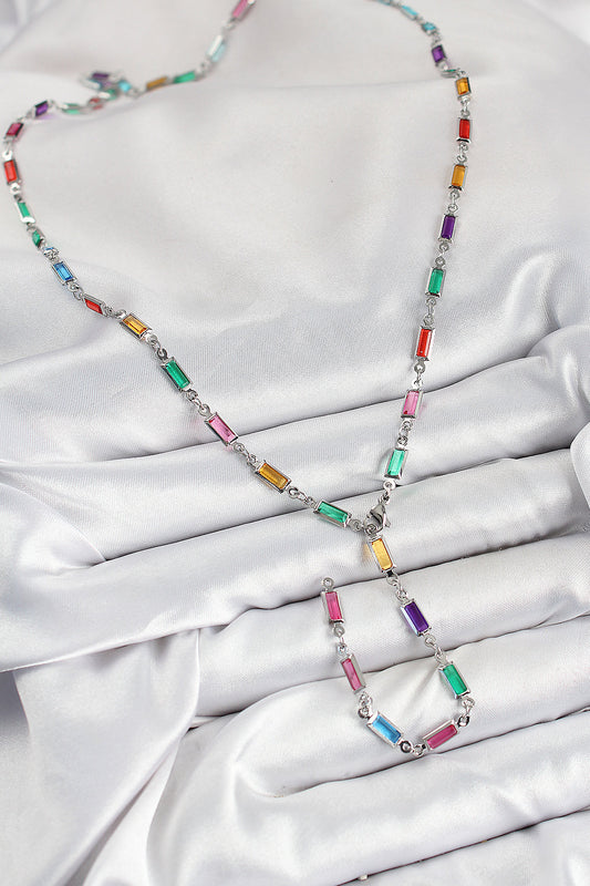 BKO10385 - Pirinç Renkli Zirkon Taşlı Dikdörtgen Model Gümüş Renk Kadın Y Kolye