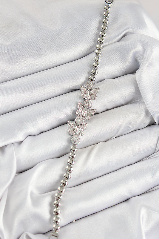 BB7542 - Pirinç Zirkon Taşlı Kelebek Model Gümüş Renk Kadın Bileklik