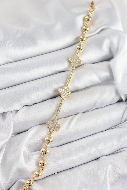 BB7561 - Pirinç Zirkon Taşlı Yonca Model Gold Renk Kadın Bileklik