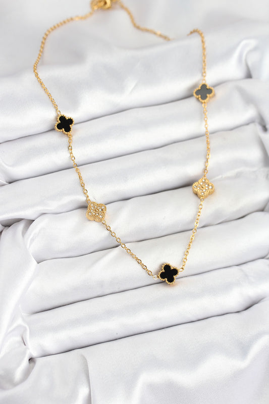 BKO10592 - 316L Çelik Zincir Gold Renk Siyah ve Zirkon Taşlı Baby Boy Yonca Kadın Kolye