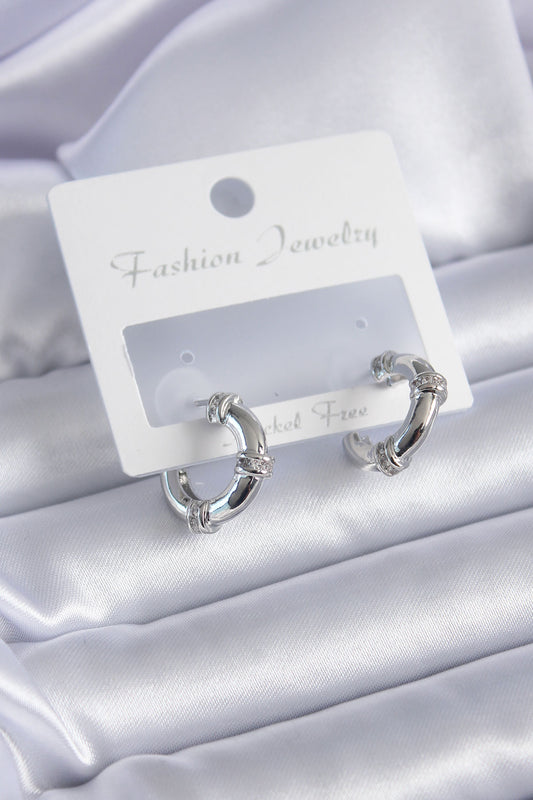 BKP7856 - Gümüş Renk Zirkon Taşlı Halka Model Pirinç Kadın Küpe