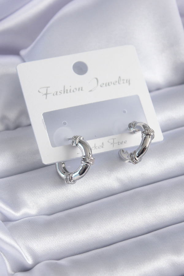 BKP7856 - Gümüş Renk Zirkon Taşlı Halka Model Pirinç Kadın Küpe