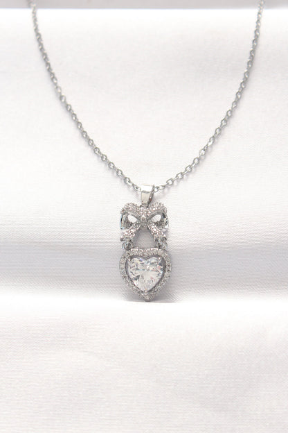 BKO8519 - 316L Çelik Silver Renk Zirkon Taşlı Kalpli Fiyonk Kolye