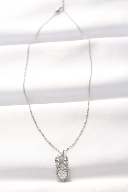 BKO8519 - 316L Çelik Silver Renk Zirkon Taşlı Kalpli Fiyonk Kolye