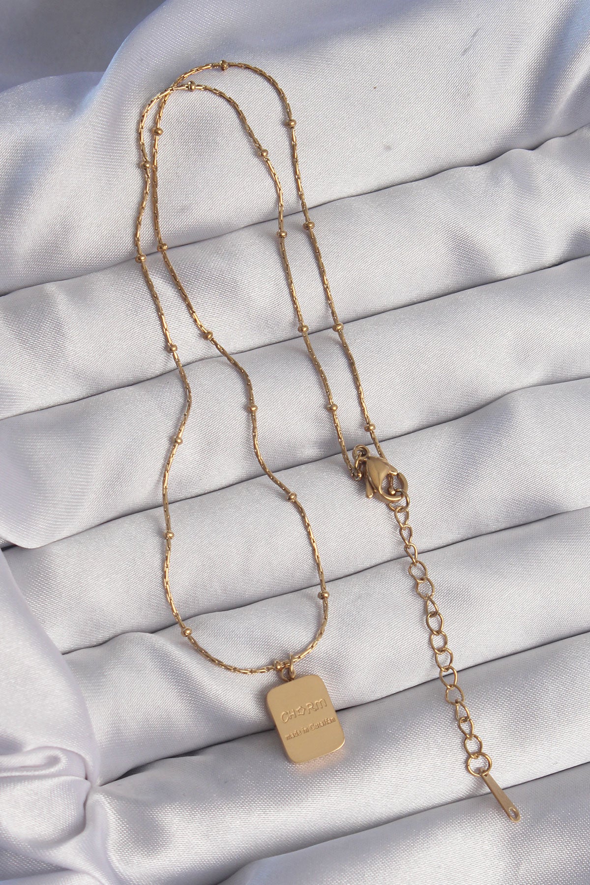BKO8928 - 316L Çelik Gold Renk Kare Charm Model Kolye