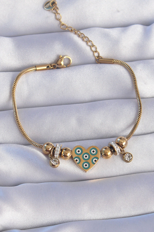 BB6199 - 316L Çelik Gold Renk Zirkon Taşlı Nazarlı Kalp Tasarımlı Bileklik