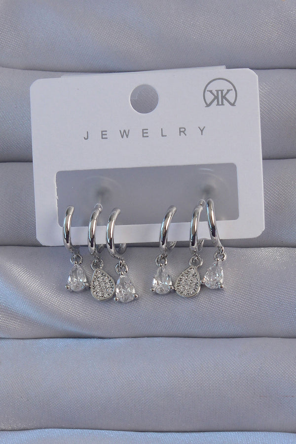 BKP9141 - Pirinç Gümüş Renk Zirkon Taşlı Damla Model Çoklu Görünüm Yarım Halka Küpe