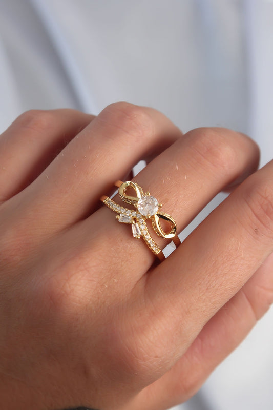 BYK3287 - Pirinç Ayarlamalı Gold Renk Zirkon Taşlı 2li Görünüm Fiyonk Yüzük