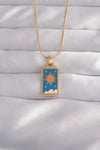 BKO9026 - 316L Çelik Gold Renk Mavi Mineli Güneş Model Tarot Kolye