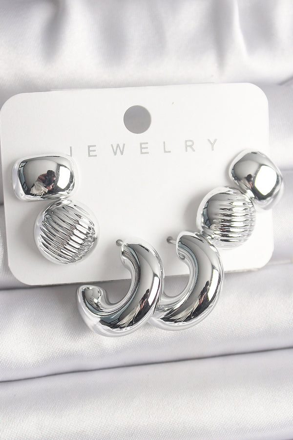 BKP10025 - Gümüş Renk İşlemeli Daire Halka Model CCB Platik Kadın Küpe Seti