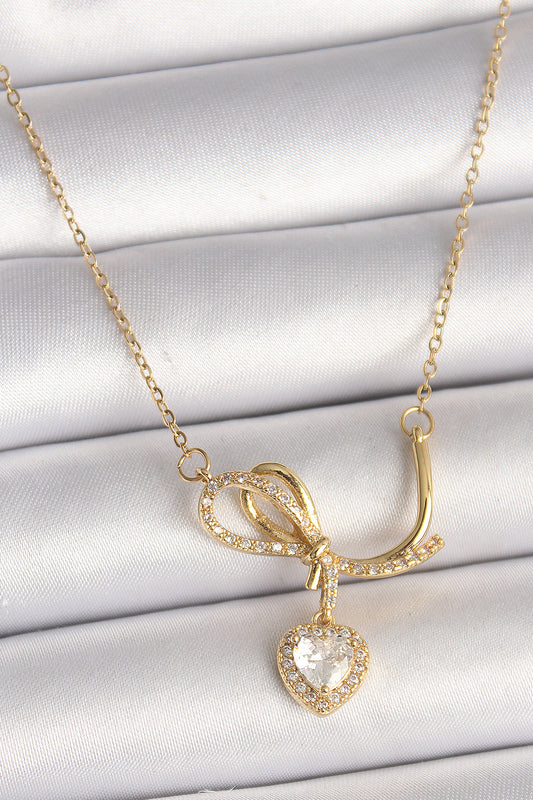 BKO9857 - 316L Çelik Gold Renk Zincir Zirkon Taşlı Düğüm Sallantı Kalp Model Kadın Kolye