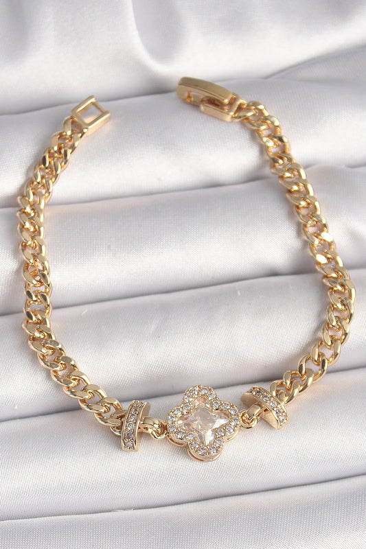 BB6818 - Pirinç Gold Renk Zirkon Taşlı Yonca Figür Zincir Model Kadın Bileklik