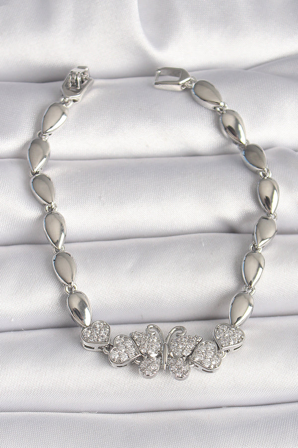BB6841 - Pirinç Gümüş Renk Zirkon Taşlı Kelebek Figür Damla Zincir Model Kadın Bileklik