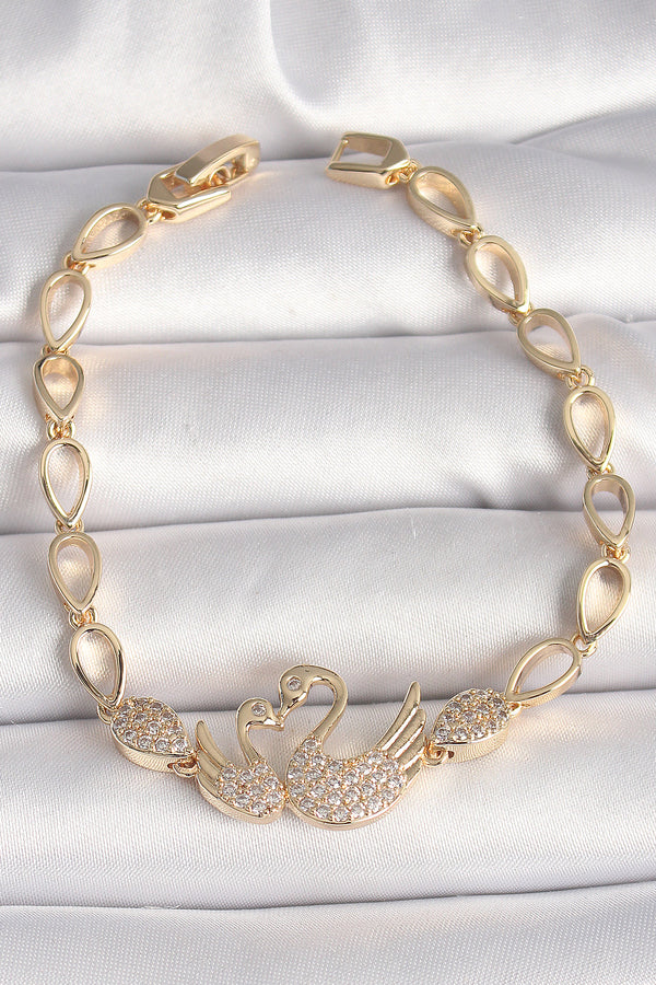 BB6849 - Pirinç Gold Renk Zirkon Taşlı Kuğu Figür Damla Zincir Model Kadın Bileklik