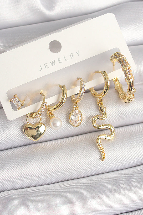 BKP10369 - Pirinç Gold Renk Sallantı Yılan Model Zirkon Taşlı Halka Kilit Kalp Detay Kadın Küpe Seti