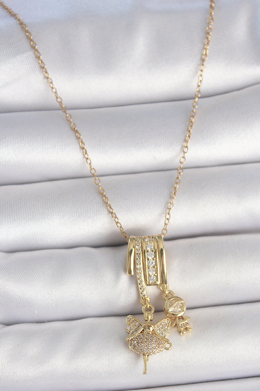 BKO10099 - 316L Çelik Gold Renk Zirkon Taşlı Sallantı Melek Figür Charm Kadın Kolye