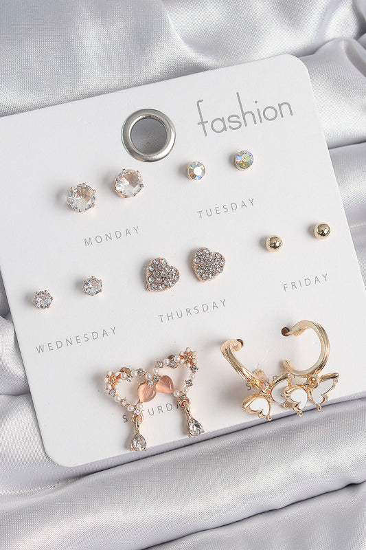 BKP10539 - Pirinç Gold Renk Zirkon Taşlı Sallantılı Kalp Figür Kelebek Detay 7 Çift Kadın Küpe Seti