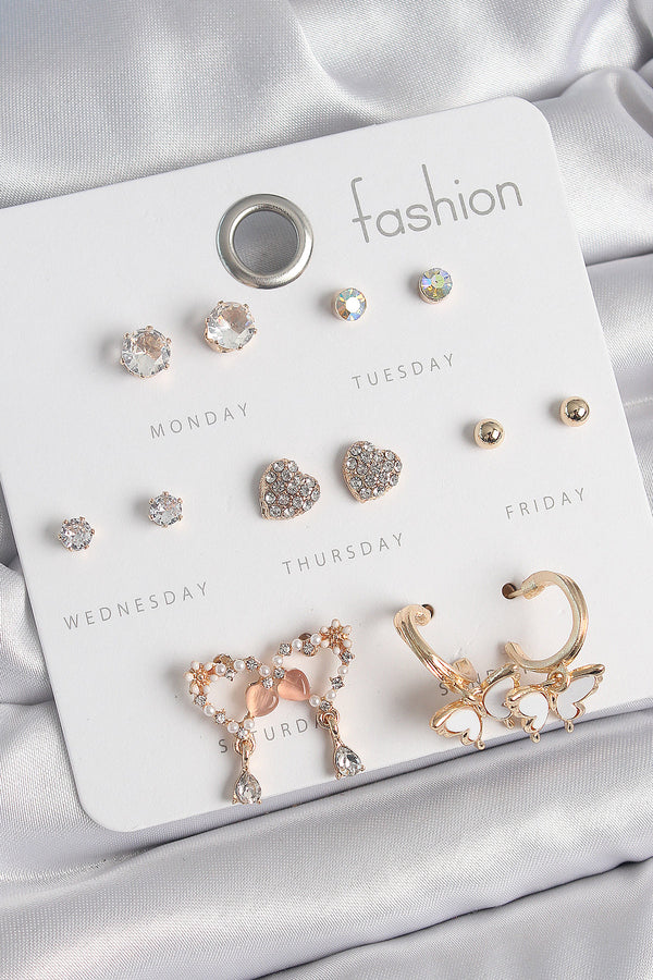 BKP10539 - Pirinç Gold Renk Zirkon Taşlı Sallantılı Kalp Figür Kelebek Detay 7 Çift Kadın Küpe Seti