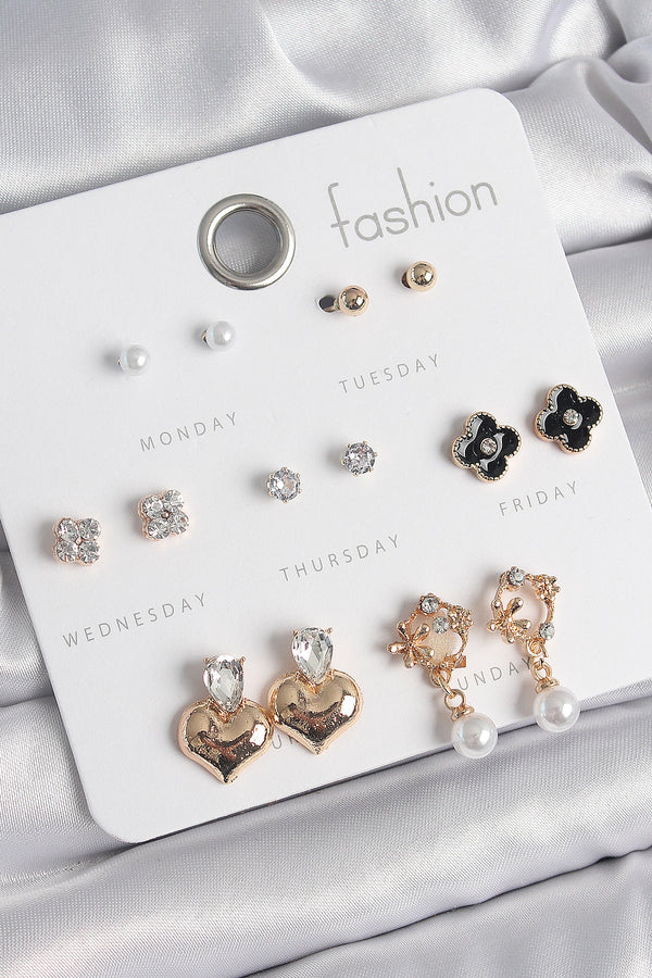 BKP10541 - Pirinç Gold Renk Zirkon Taşlı Kalp Figür Siyah Yonca Detay 7 Çift Kadın Küpe Seti