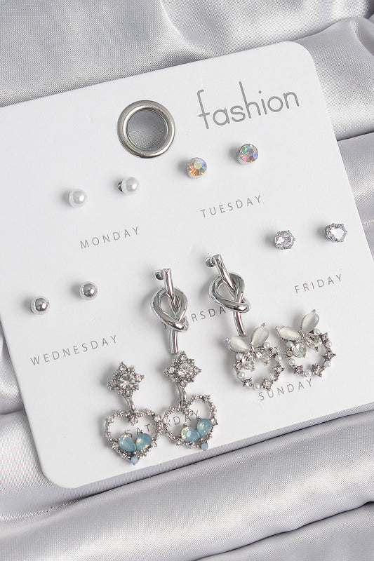 BKP10548 - Pirinç Gümüş Renk Sallantı Zirkon Taşlı Kalp Model Düğüm Detay 7 Çift Kadın Küpe Seti