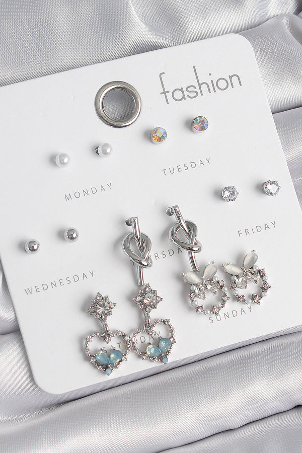 BKP10548 - Pirinç Gümüş Renk Sallantı Zirkon Taşlı Kalp Model Düğüm Detay 7 Çift Kadın Küpe Seti