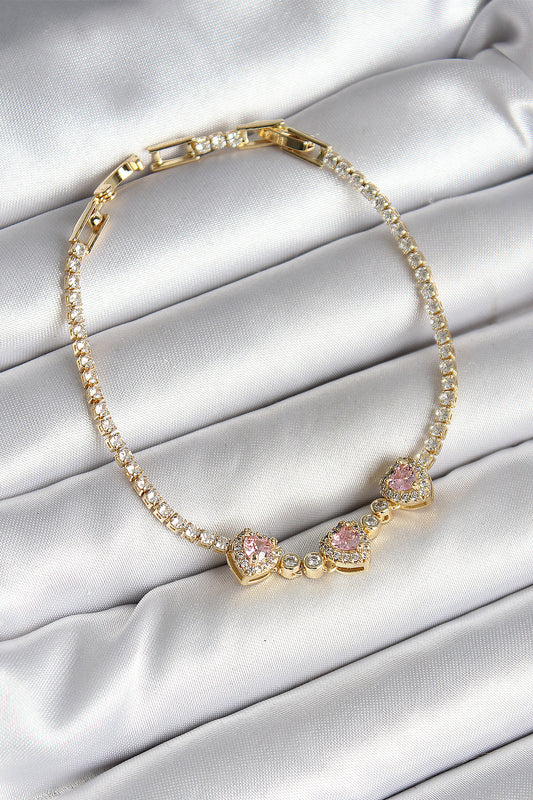 Pirinç Sıralı Pembe Kalp Figürlü Zirkon Taşlı Gold Renk Kadın Bileklik - BB6983