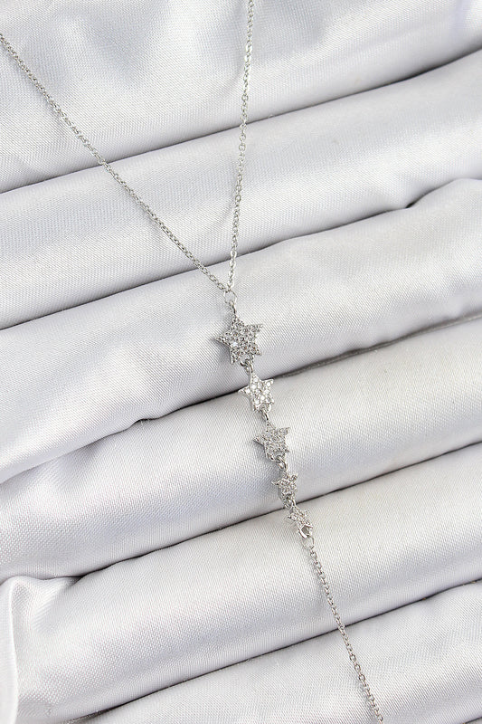 BKO10313 - Pirinç Zirkon Taşlı Sıralı Yıldız Figürlü Y Model Gümüş Renk Kadın Kolye