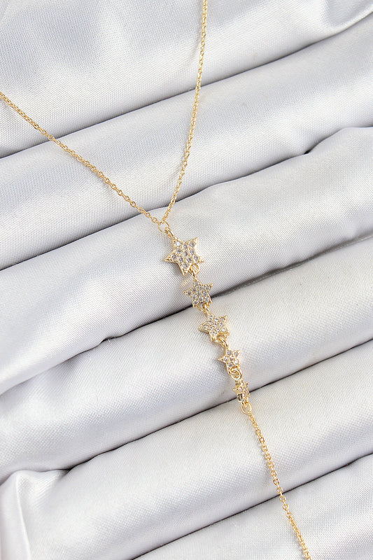 BKO10314 - Pirinç Zirkon Taşlı Sıralı Yıldız Figürlü Y Model Gold Renk Kadın Kolye