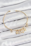 BB7355 - Pirinç Zirkon Taşlı Kelebek Ve Yıldız Model Gold Renk Charm Bileklik