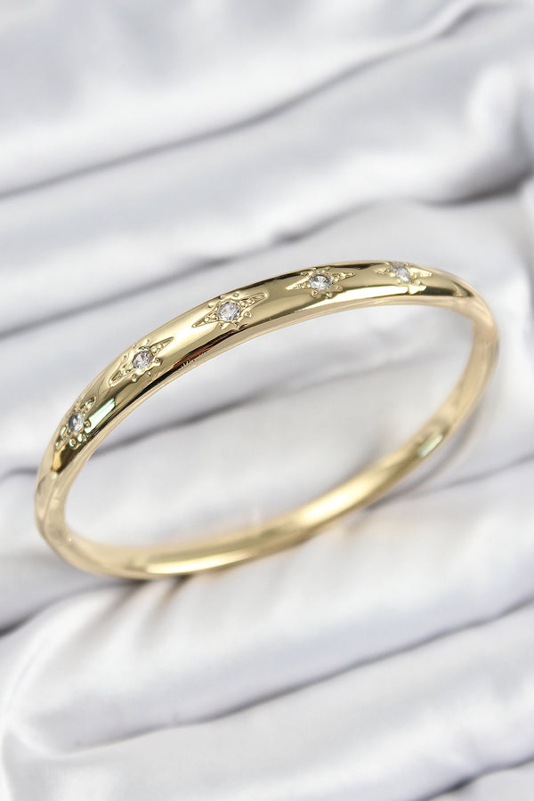 BB7570 - Pirinç Zirkon Taşlı Kutup Yıldızı Model Gold Renk Kadın Kelepçe