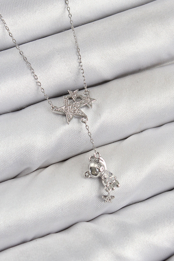 BKO10419 - Pirinç Zirkon Taşlı Sallantılı Ayıcıklı Yıldız Model Gümüş Renk Kadın Kolye