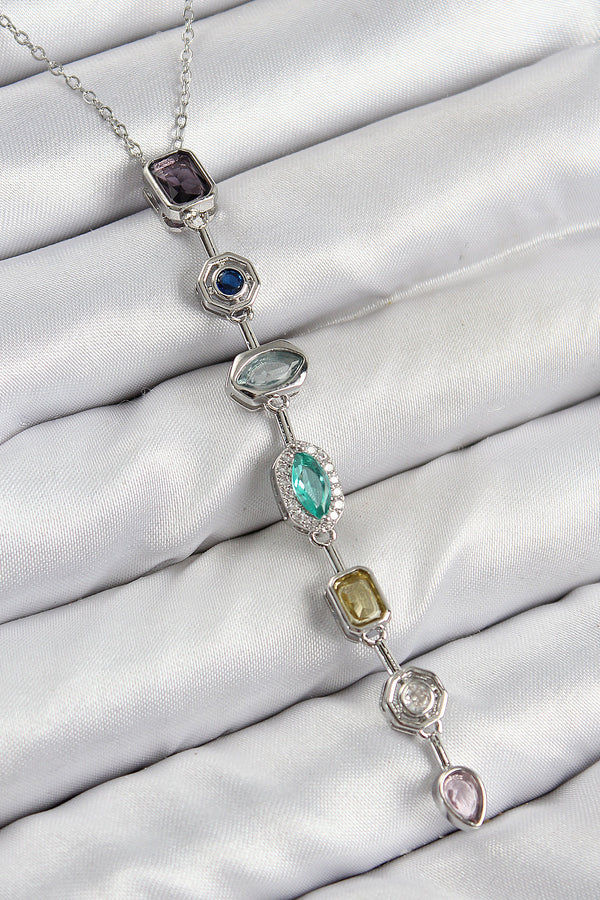 BKO10440 - Pirinç Renkli Zirkon Taşlı Model Gümüş Renk 7 Element Kadın Y Kolye