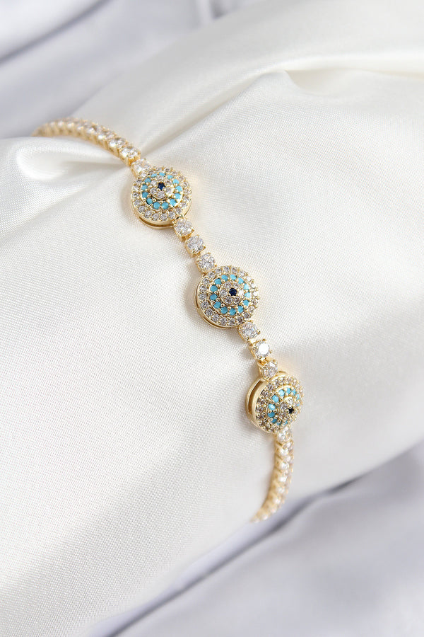 BB7705 - Pirinç Zirkon Taşlı Nazar Model Gold Renk Kadın Bileklik