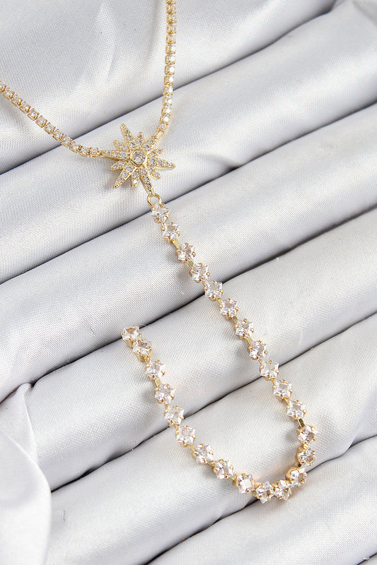 BKO10448 - Pirinç Zirkon Taşlı Kutup Yıldızı Model Gümüş Renk Y Kolye