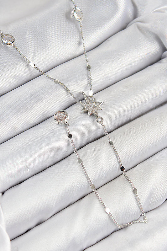 BKO10453 - Pirinç Zirkon Taşlı Kutup Yıldızı Model Gümüş Renk Y Kolye