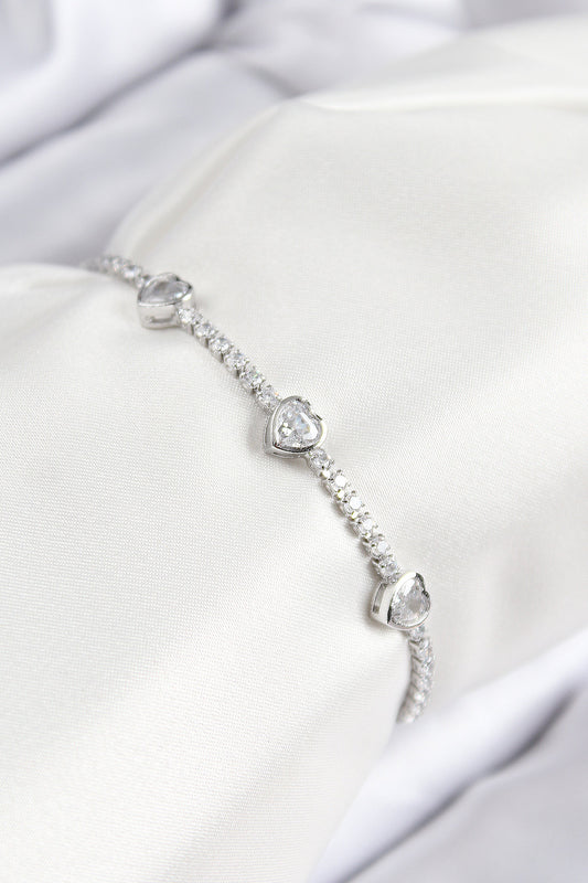 BB7728 - Pirinç Zirkon Taşlı Sıralı Kalp Model Gümüş Renk Asansörlü Kadın Bileklik