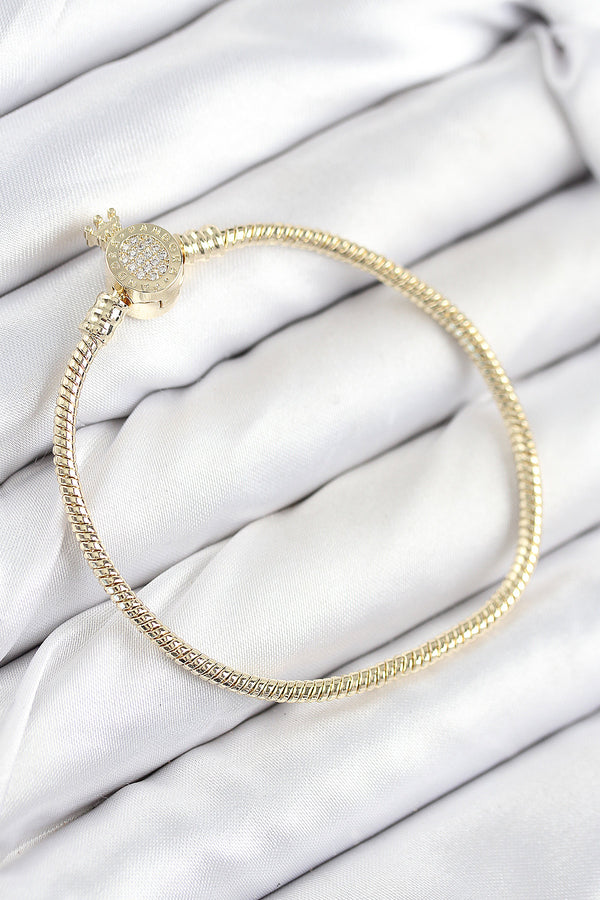 BB7808 - Pirinç Charm Zirkon Taşlı Taç Model Gold Renk Kadın Bileklik