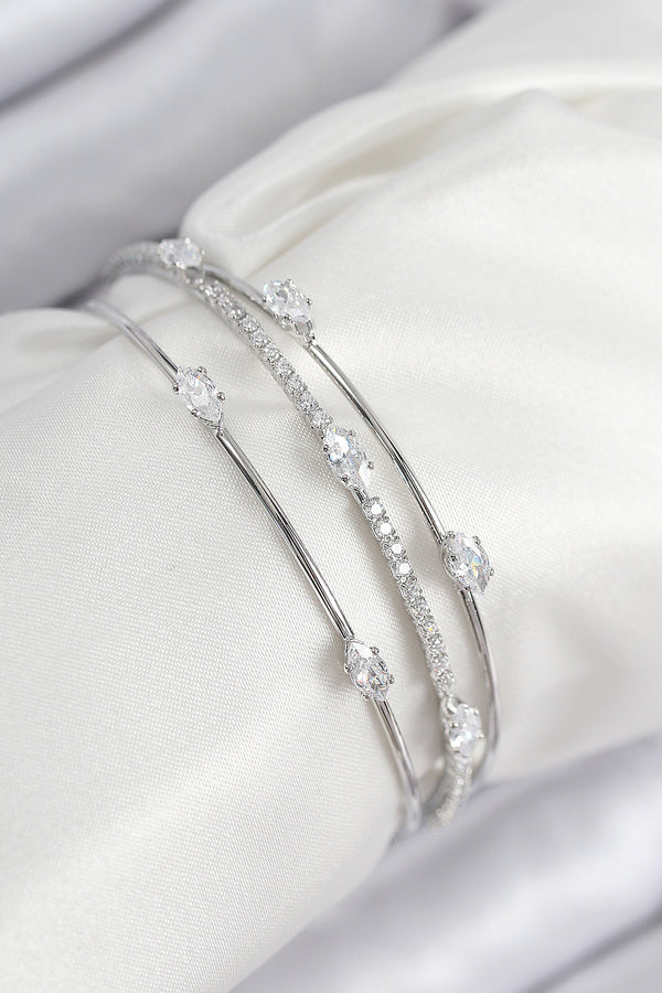 BB7868 - Pirinç Zirkon Taşlı Su Yolu Model Gümüş Renk Kadın Bileklik