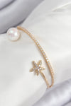 BB7883 - Pirinç Zirkon Taşlı Yıldız Ve İnci Model Gold Renk Kadın Bileklik