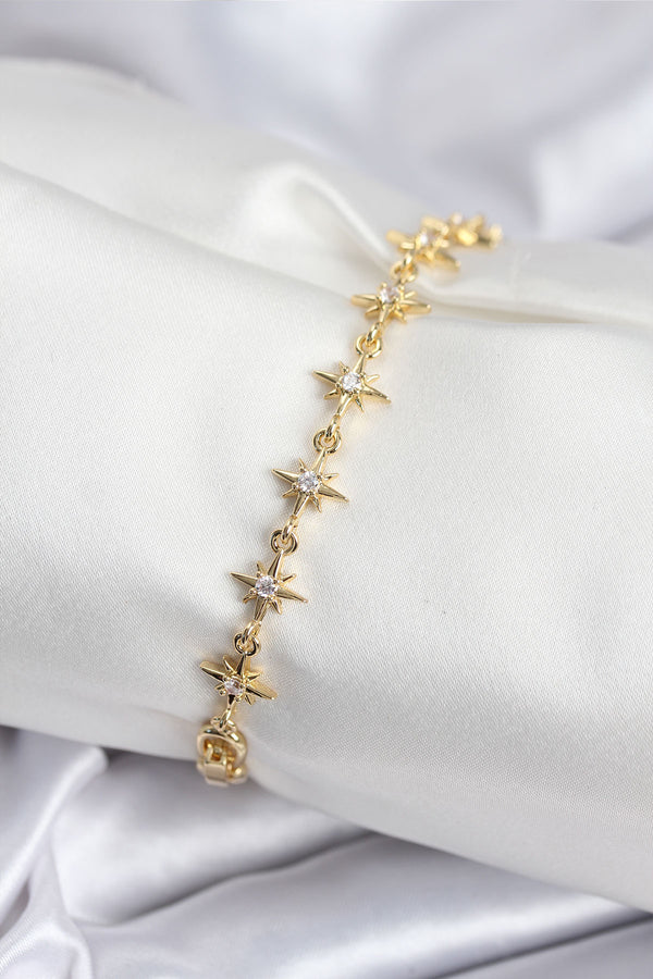 BB7927 - Pirinç VIP Seri Gold Renk Sıralı Kutup Yıldızı Kadın Bileklik