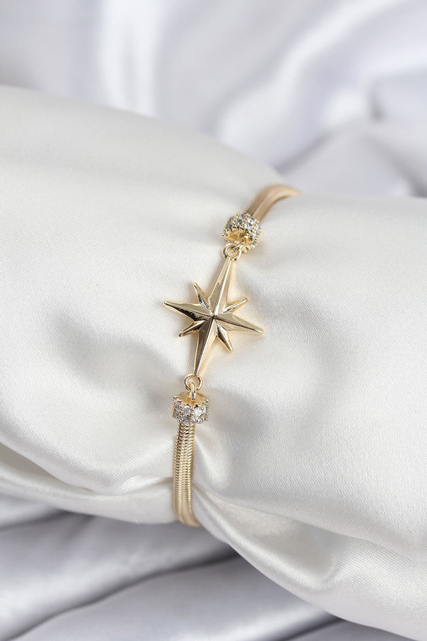 BB7937 - Pirinç VIP Seri Gold Renk Kutup Yıldızı Model Kadın Bileklik
