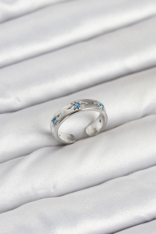 BYK3897 - Pirinç Gümüş Renk Mavi Zirkon Taşlı Kutup Yıldızı Model Kadın Yüzük