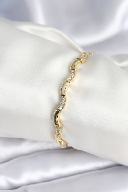 Pirinç Gold Renk Dalgalı Model Kadın Bileklik - BB7962