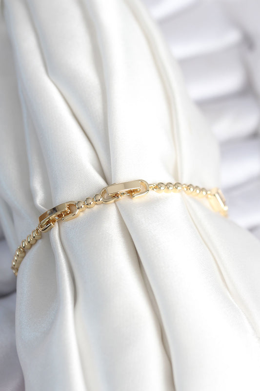 BB7967 - Pirinç Gold Renk Zirkon Taşlı Kalpli Model Kadın Bileklik