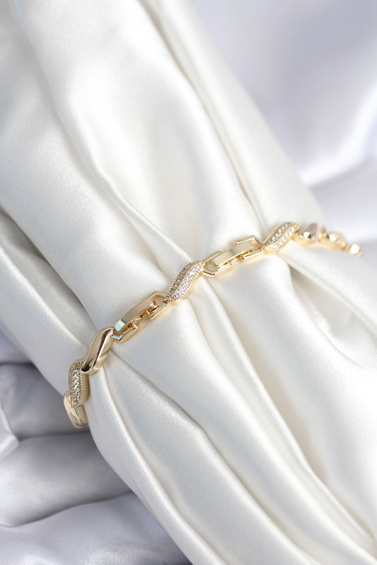 Pirinç Gold Renk Zirkon Taşlı Sarmal Model Kadın Bileklik - BB7970