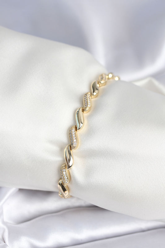 Pirinç Gold Renk Zirkon Taşlı Sarmal Model Kadın Bileklik - BB7970