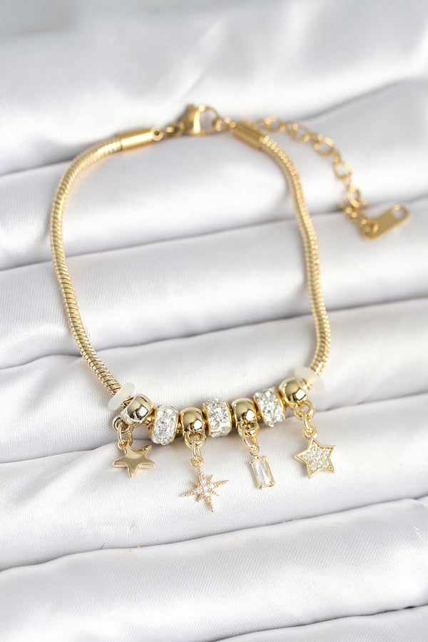 BB7991 - Pirinç Gold Renk Kutup Yıldızı Charmlı Kadın Bileklik
